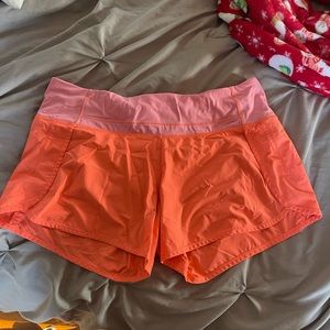 Orange lululemon shorts